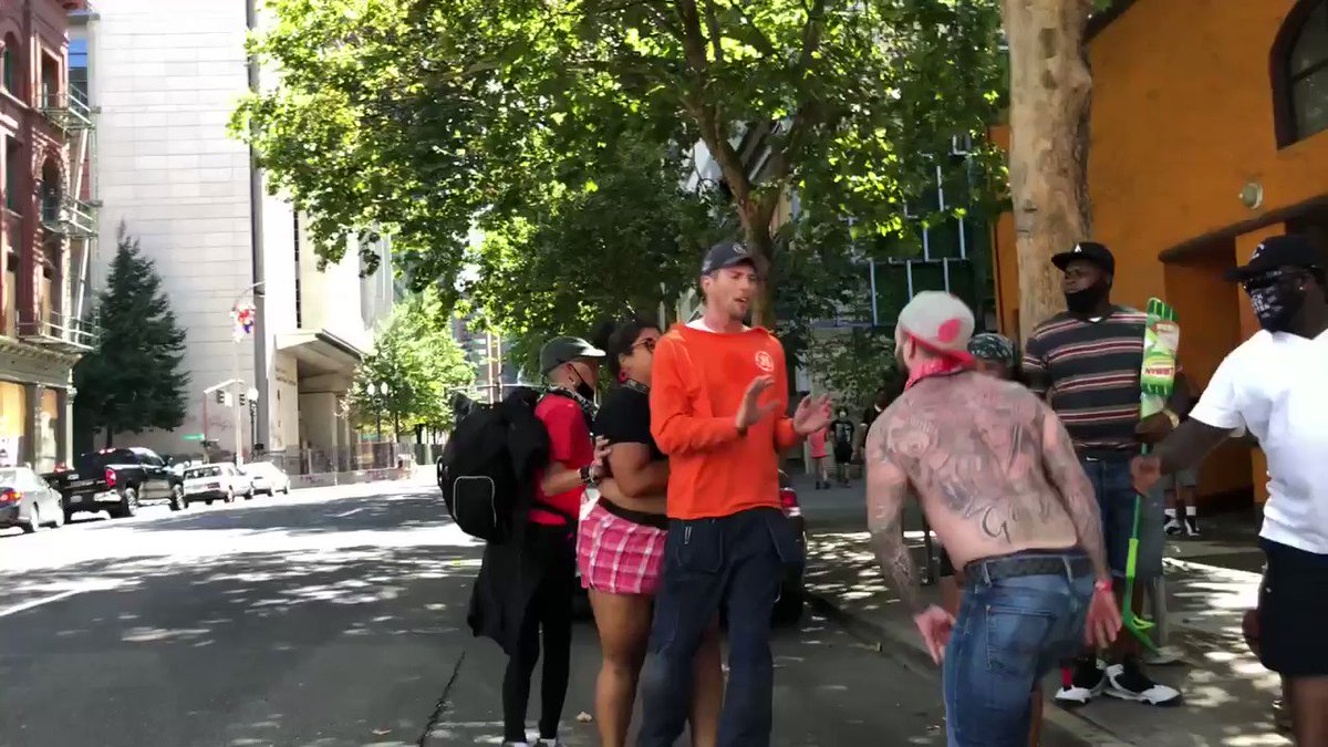 Even during the day time, the area around the Portland federal courthouse is lawless as police are instructed to stay away. After BLM protesters harassed and assaulted those standing with flags, they beat up a man. Video by @livesmattershow: https://t.co/8IGn0Z3P9E