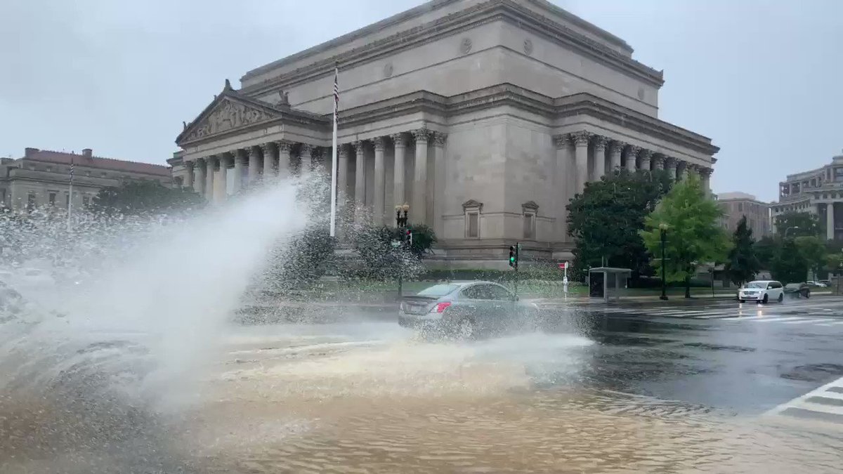 DC FLASH FLOODING Drains overflowing at Constitution Avenue & 7th Streets as downpours