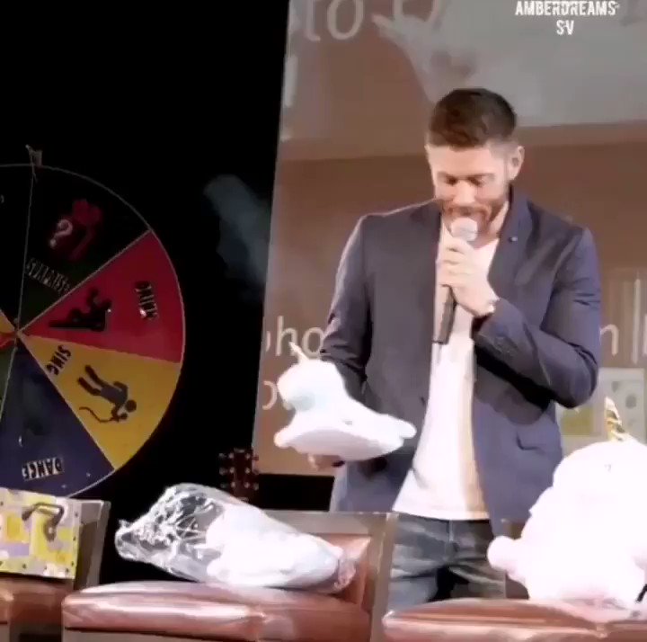 Happy birthday jensen ackles  here he is talking to unicorn slippers
 