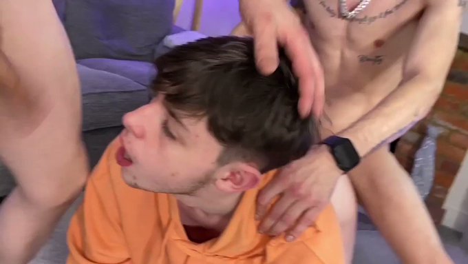 Filling his throat with my big cock while my pal breeds his tight hole this boi takes our big bareback
