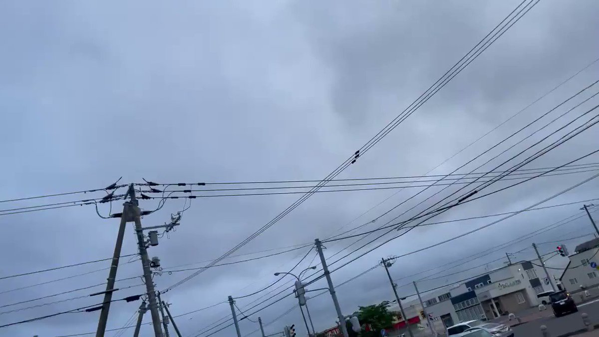 信号待ち ポールの下敷き 自転車 北海道