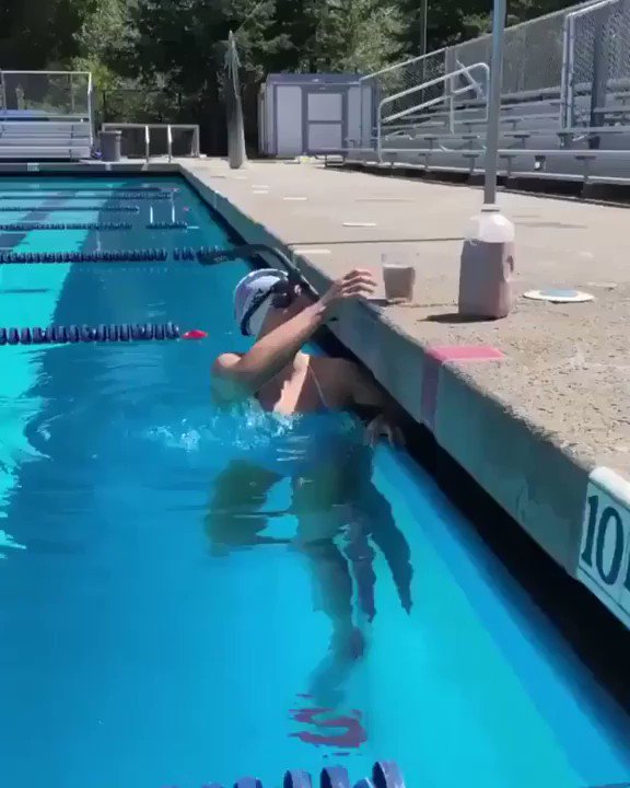 Olympic Gold Medalist Katie Ledecky swimming with a glass of chocolate milk on her head to demonstrate the most efficient swimming technique. No splashing.. https://t.co/kceon3cUHS