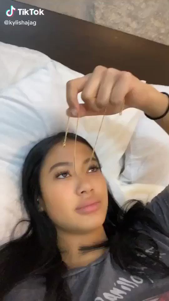 Archive on twitter girl hanging dangling chain in face holding chain