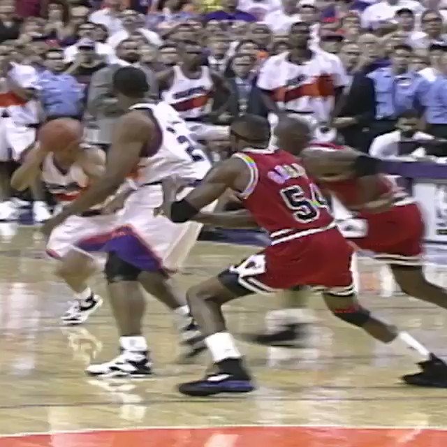 The Chicago Bulls' Horace Grant blocks the last-second shot