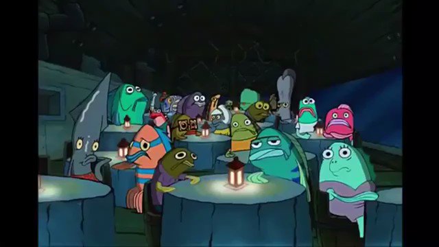 reactions on X: sad spongebob fish sitting at krusty krab table