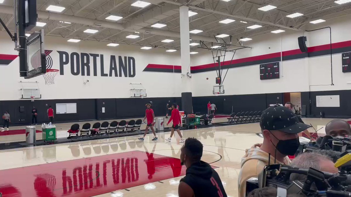 CJ McCollum draining corner threes while Damian Lillard meets with the media and talks about Jusuf Nurkic. #RipCity https://t.co/nu6hike608