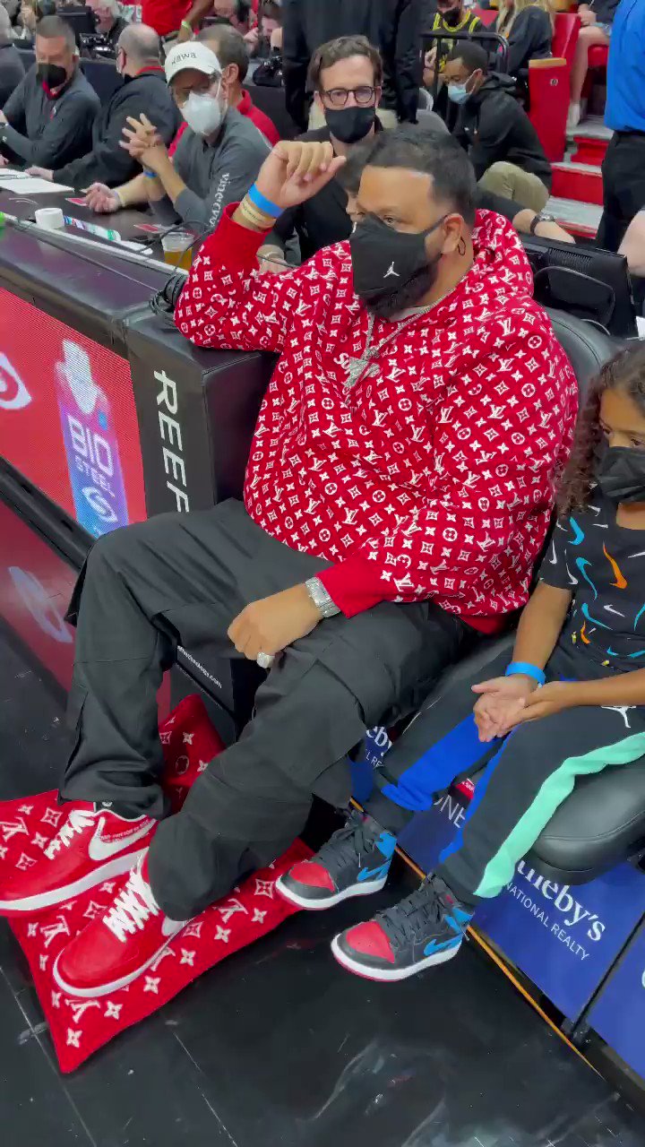 DJ Khaled Wearing a Louis Vuitton x Supreme & Jordan Outfit
