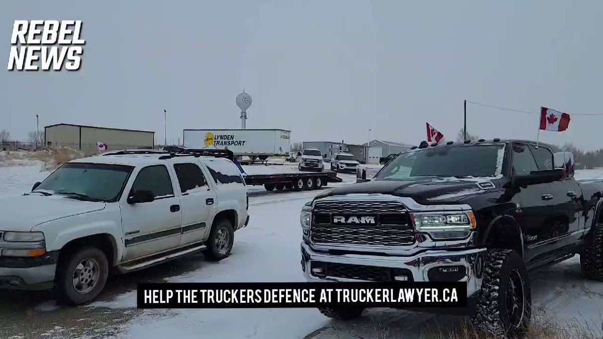 Epic Footage: Canadian Police Flinch In Standoff With Truckers Blocking Border EZgY_CF7kFyswfZM