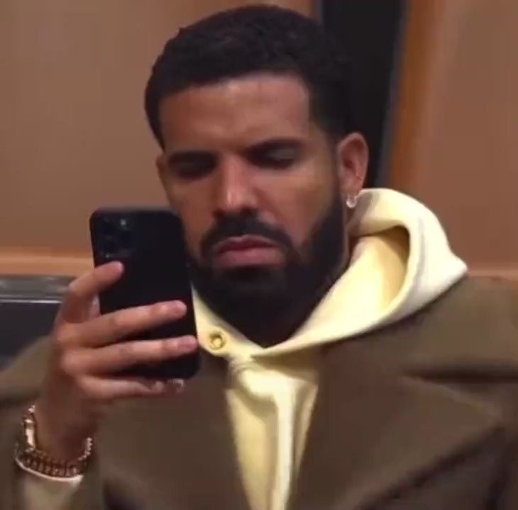 black reaction memes on Twitter "drake looking at his phone bothered