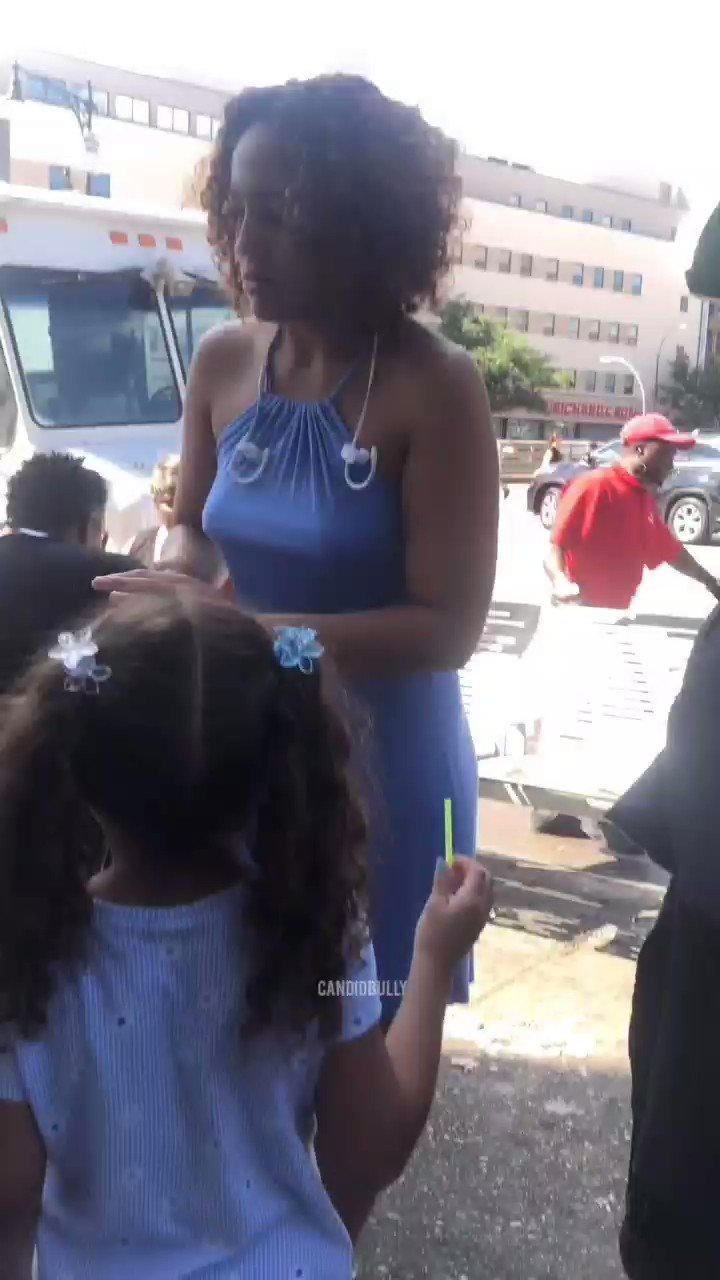 A woman's backside in tight clothing as she walks in public