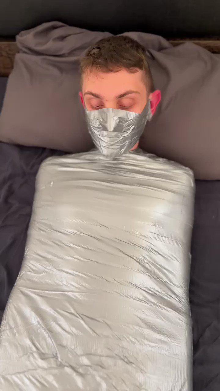 tapeandropes on X: Look at this helpless tape mummy. I wrapped  @GermanRubberboy in many layers of silver duct tape😏 Do you like the sound  of the tape while he tries to get