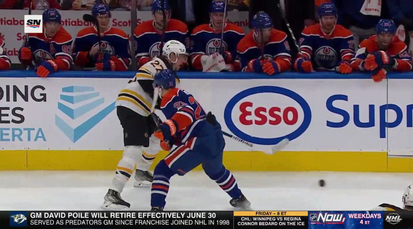 Klim Kostin Knocks Bruins' Lindholm Into Oilers' Bench With Huge