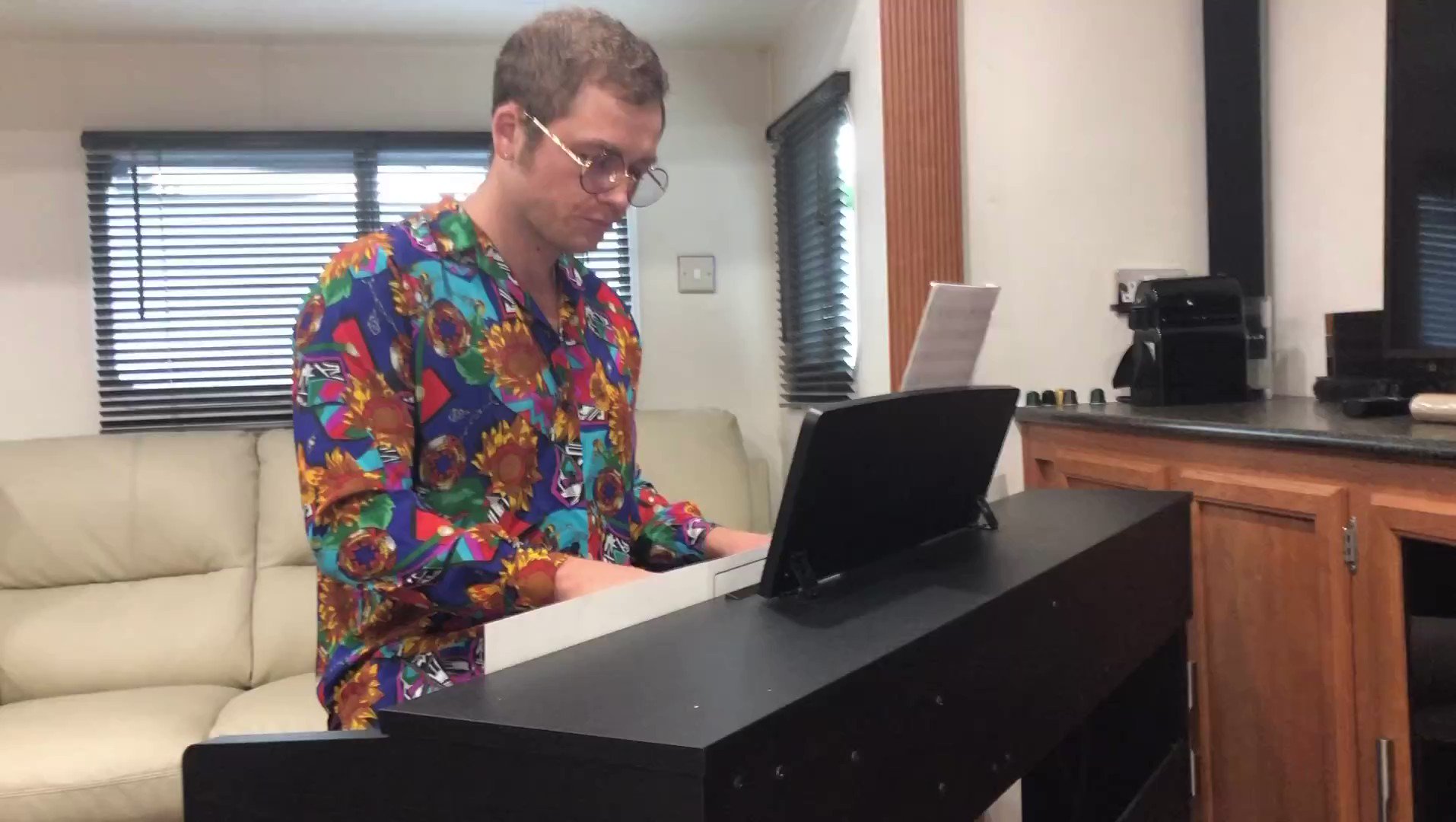 Taron egerton wishing elton john a happy birthday with this video of him prepping for rocketman 5 years ago 