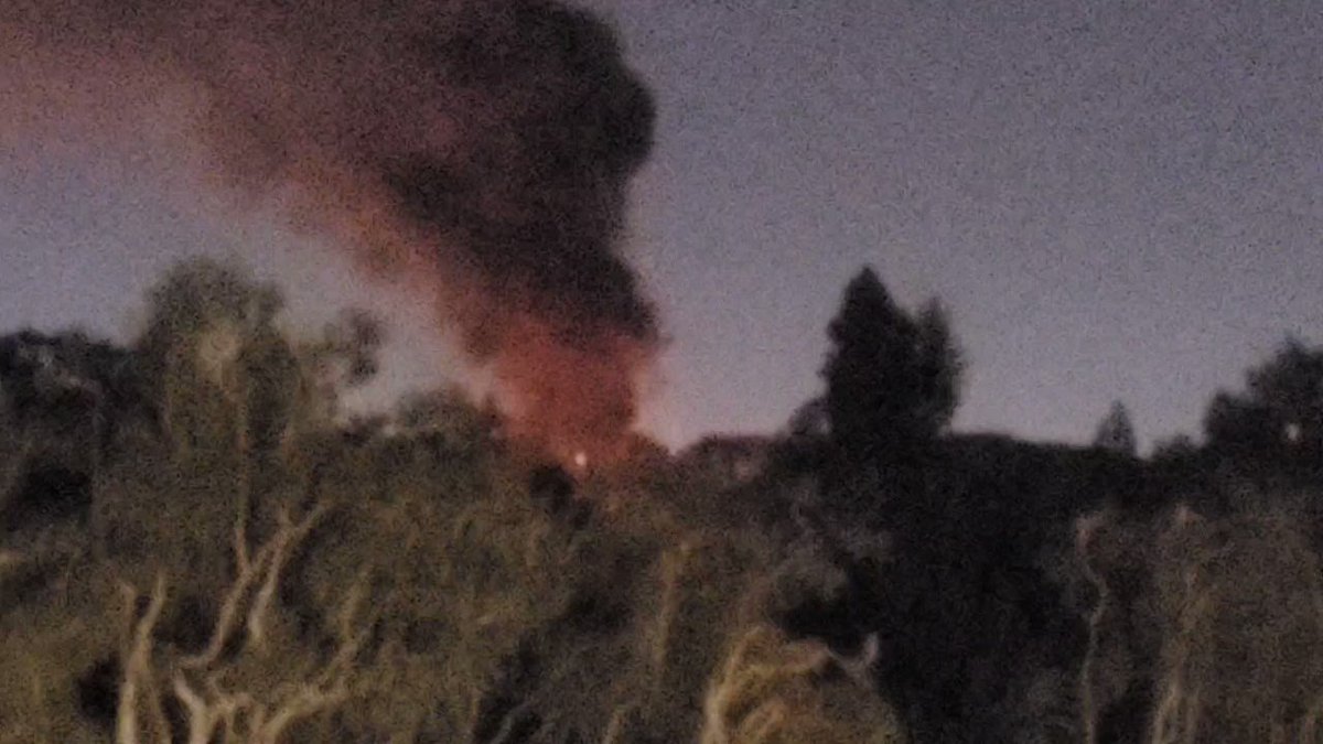 Fire at #Disneyland! Saw this from the Mickey & Friends structure. Can't tell exactly what part of the park it is at though. Maybe Rivers of America? https://t.co/apgBfGoF7a