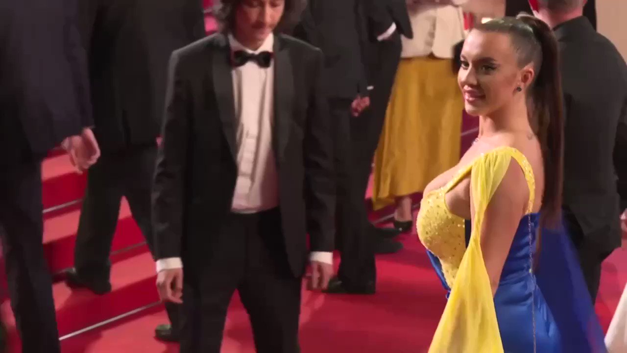 The Story Teller on Twitter: "Ukrainian Drama moment of "How Dare You Russia" at Cannes 2023 Ilona Chernobai a Ukrainian fitness trainer with one million followers on Instagram walked the red carpet