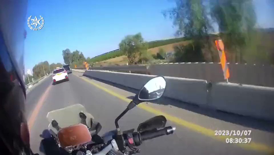 [分享] 以色列警察持手槍騎機車追逐哈馬斯