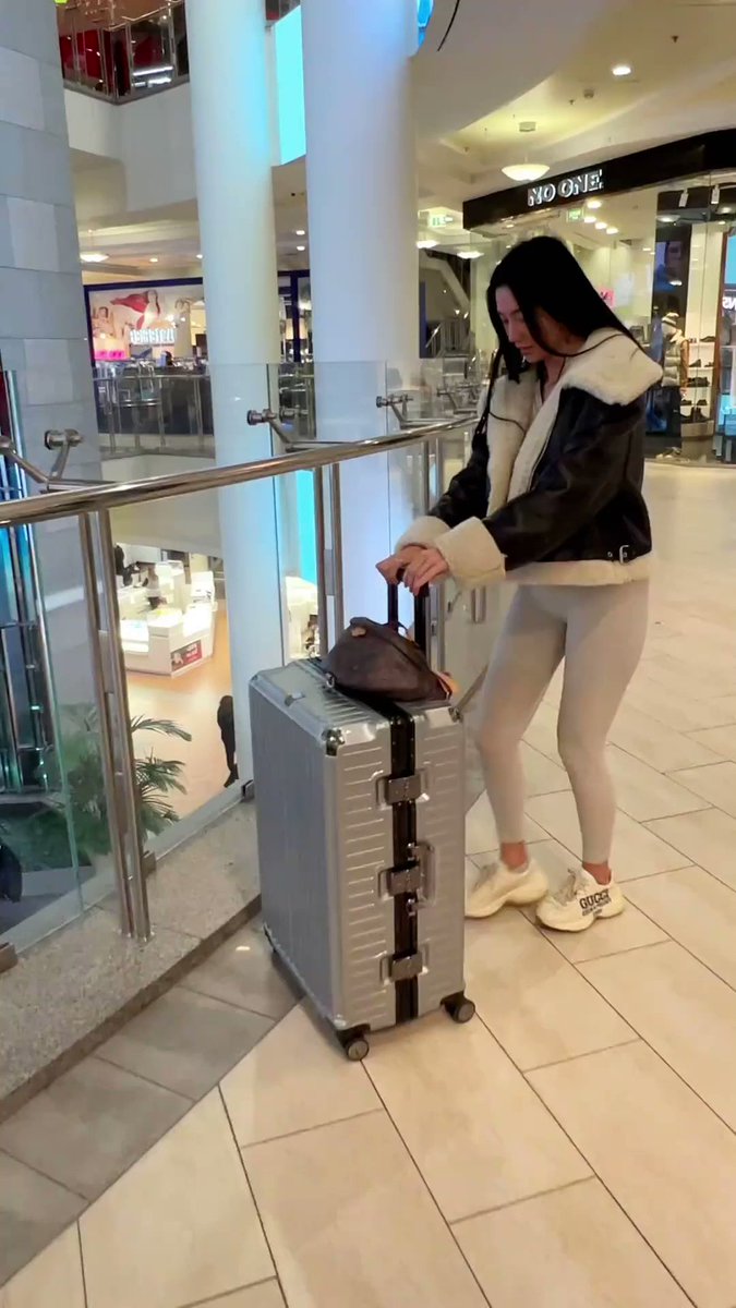 What to do when you see an Asian woman with a suitcase?