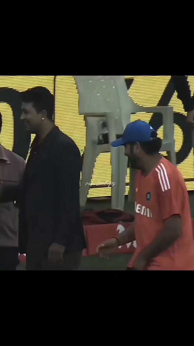 Rohit Sharma hitting his teammates Picture