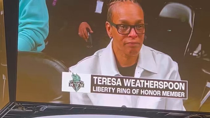 Sky's Angel Reese reacts to Liberty's Teresa Weatherspoon tribute