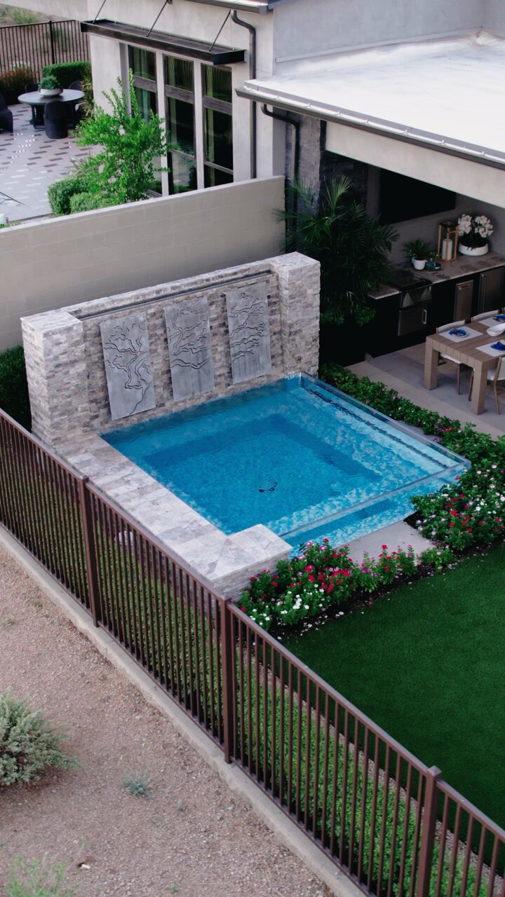 Nestled in the heart of northern Scottsdale, the Caullins presents a breathtaking bright blue spa, elegantly framed by natural stack stone on one side and expansive see-through glass on the other. 

Discover the epitome of Outdoor Living.
480-777-9305
http://www.creativeenvironments.com 