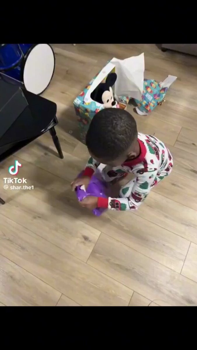 Kid receives the best Christmas present and goes straight to using it in the best possible way. 