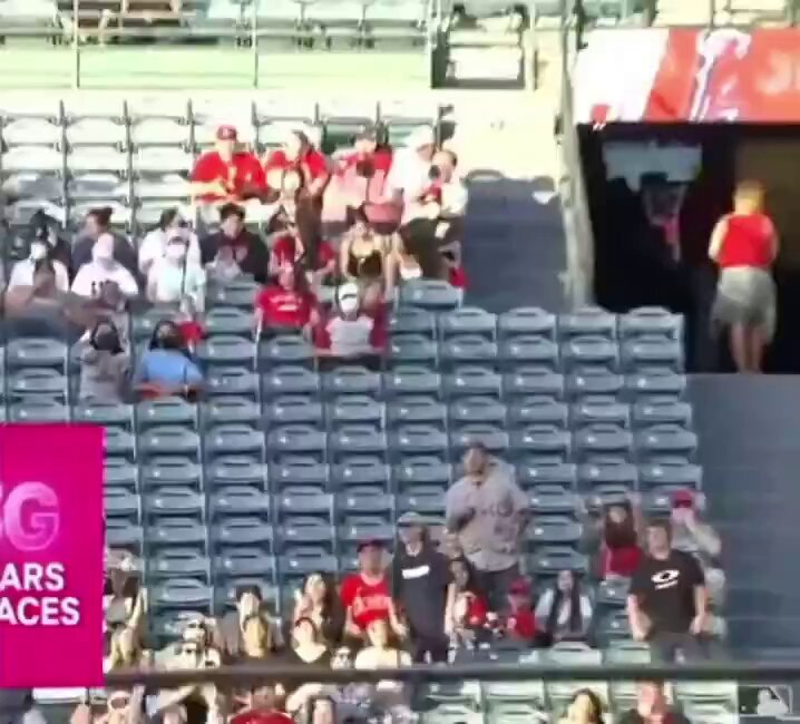 Fan catches a ball and gives it to a little kid, then... 
