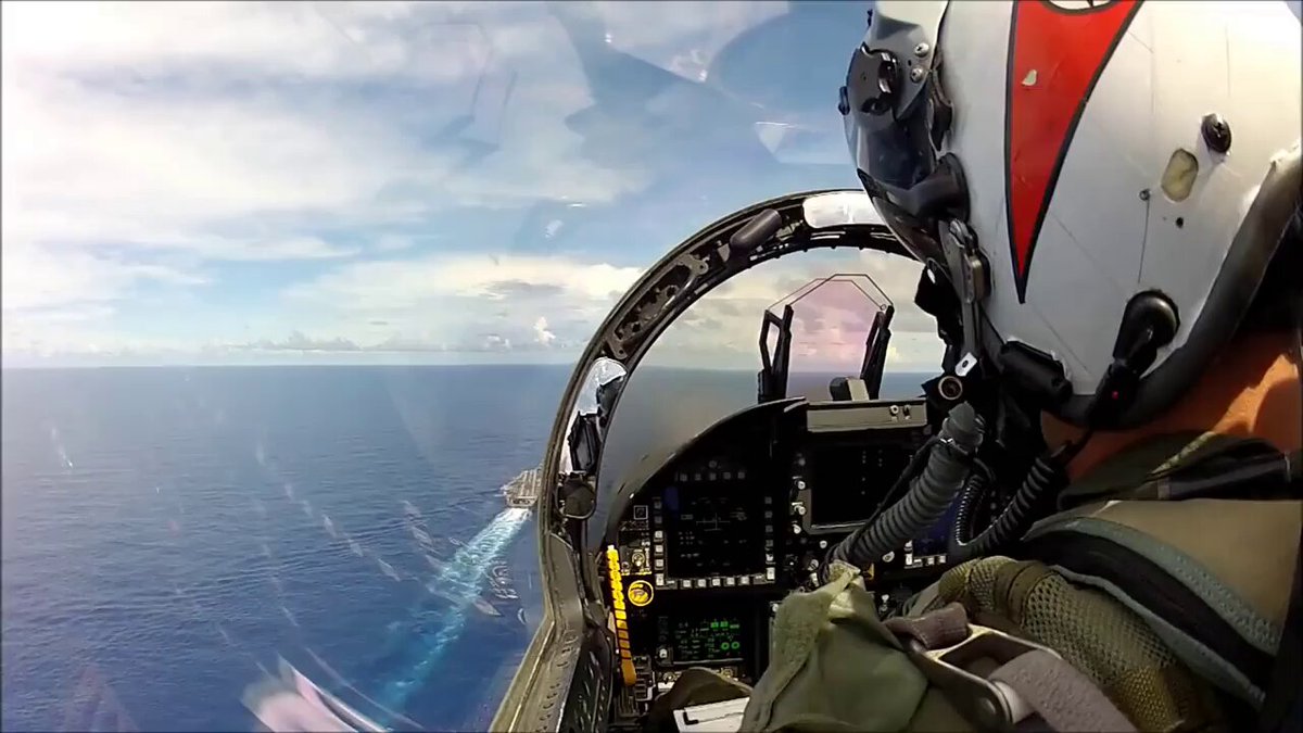 Pilot trying to land on aircraft carrier 