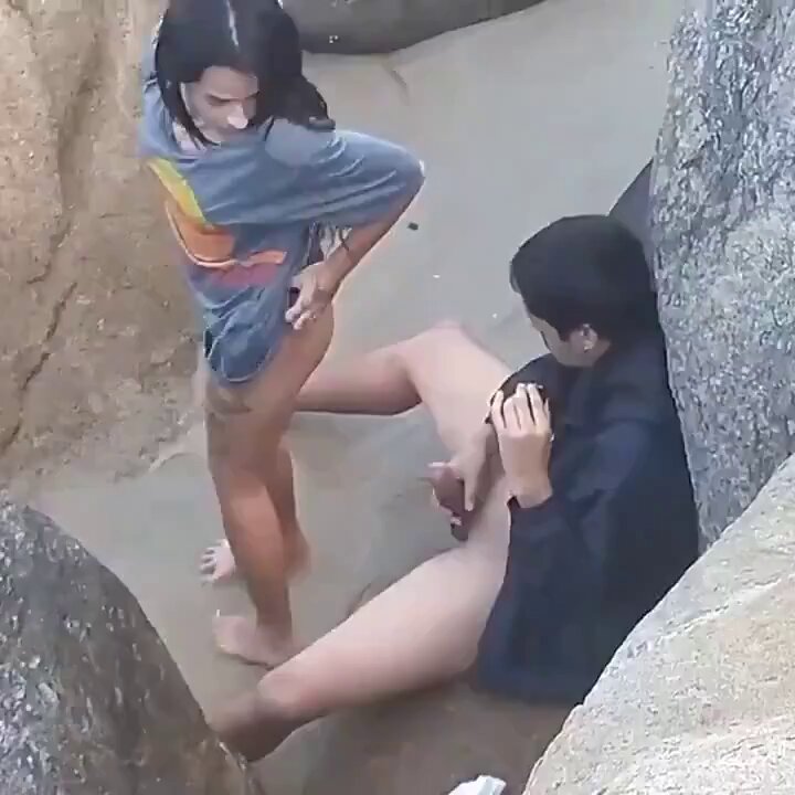 Young Couple on Sea Rocks