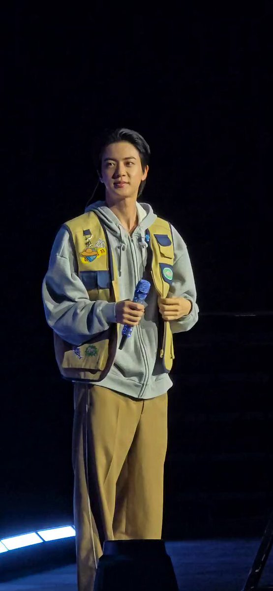 seokjin looks so adorable in his silly little fishing vest