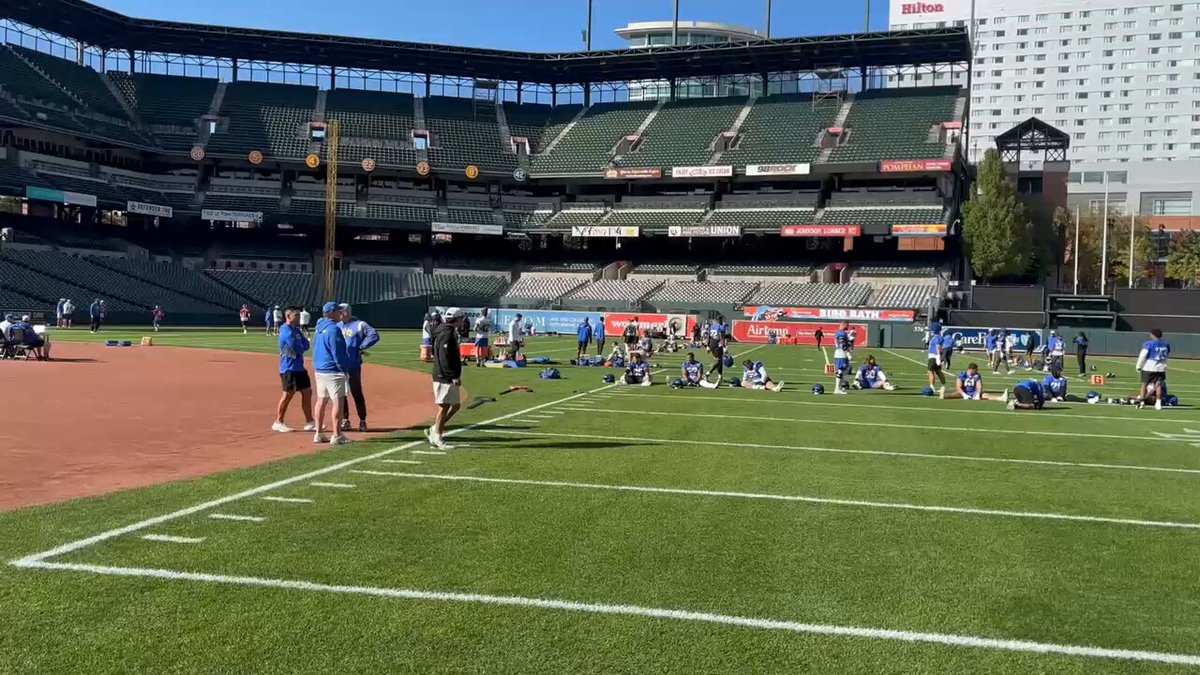 Rams loosening up for start of practice at Camden Yards. 