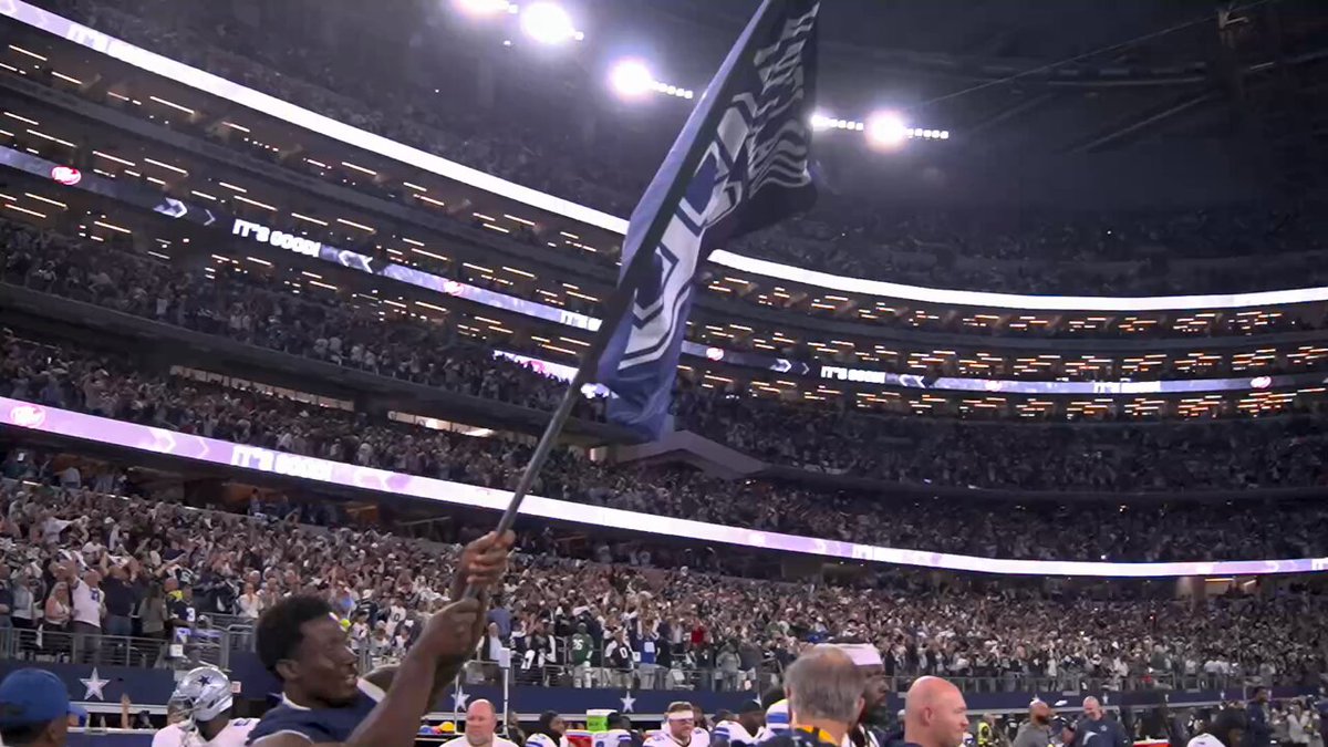 The Cowboys waved a flag with Marshawn Kneeland's number on it after the win! 
