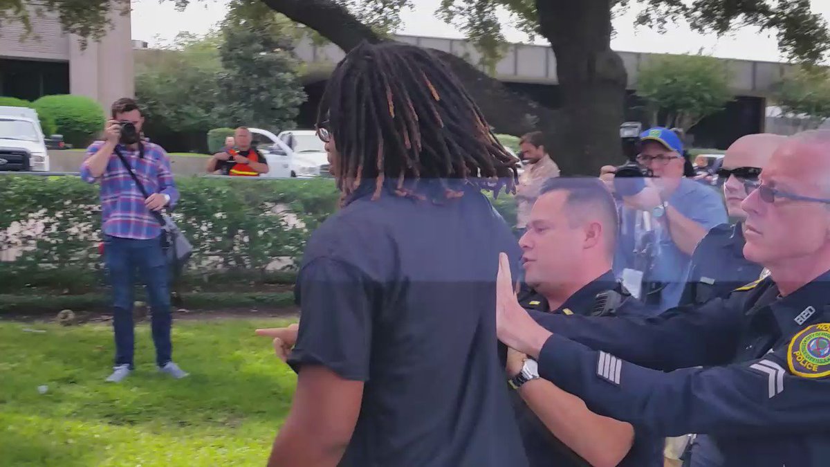 BlackLivesMatter protestor jumped barricade into media area. Peacefully escorted back. @KPRC2