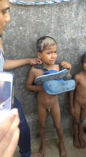 MUMBAI NEWS - Shameful video of 2 street children paraded naked, hair tonsured, chappal on their neck. All this for theft chakli from a Ulhasnagar shop.  