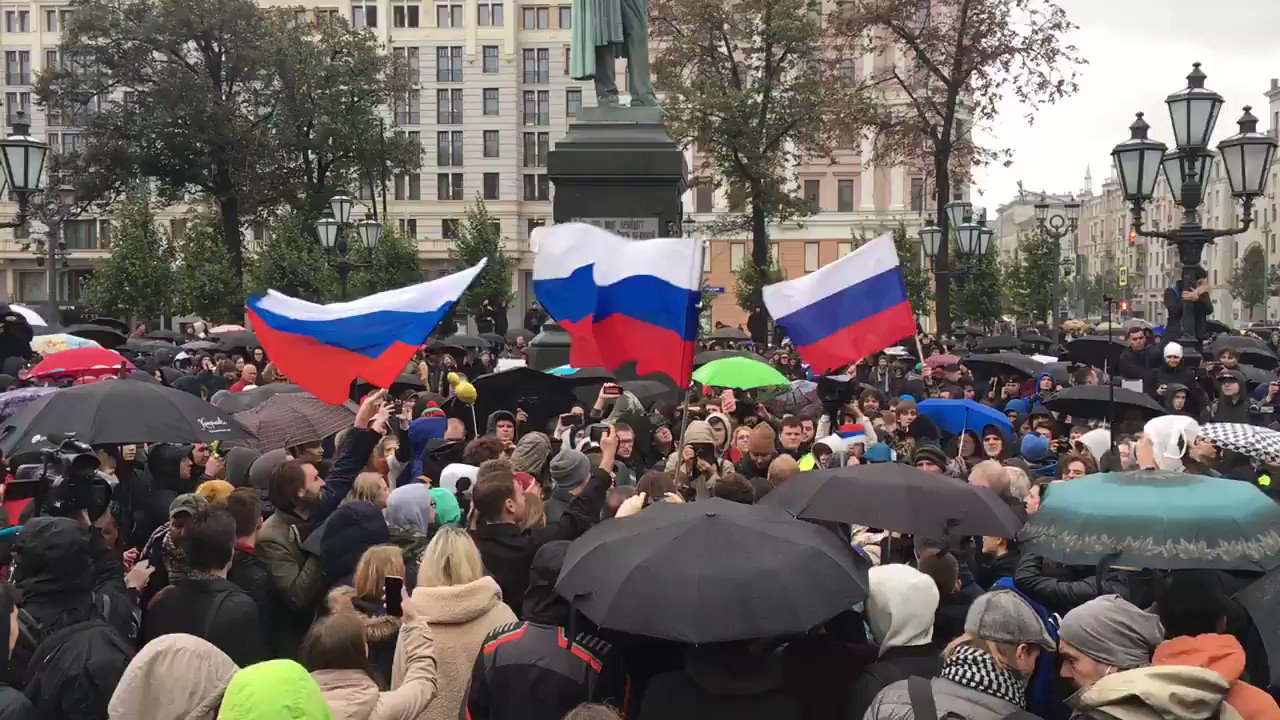 Few hundred at protest. Crowd chanting \Happy Birthday\ (to Vladimir Putin) 
