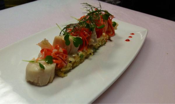 Sake and Pernod poached scallops on a rice frittata with pickled vegetable and passion vinegar. One of our appetizer!!