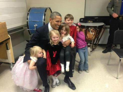 Photo released by the family of Emilie Parker,  6, of President Obama's visit. Image via @WestWingReport.