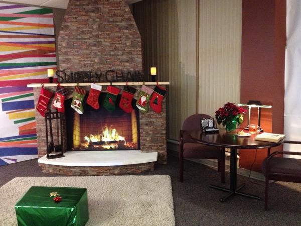blakelowe's tweet photo. The projector and laptop are hidden under the green present.  :) http://t.co/Nfb4pCkz
