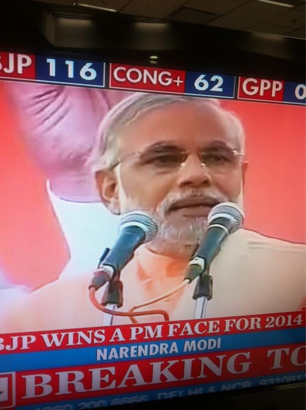 PadmajaJoshi's tweet photo. @narendramodi tries to get crowd to calm down as he makes victory speech #HTGujarat http://t.co/dPFkAfwt