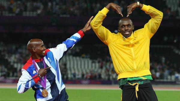 London2012's tweet image. Pic: Legends! @Mo_Farah does ‘The Bolt’ while @UsainBolt does ‘The Mo-Bot’
