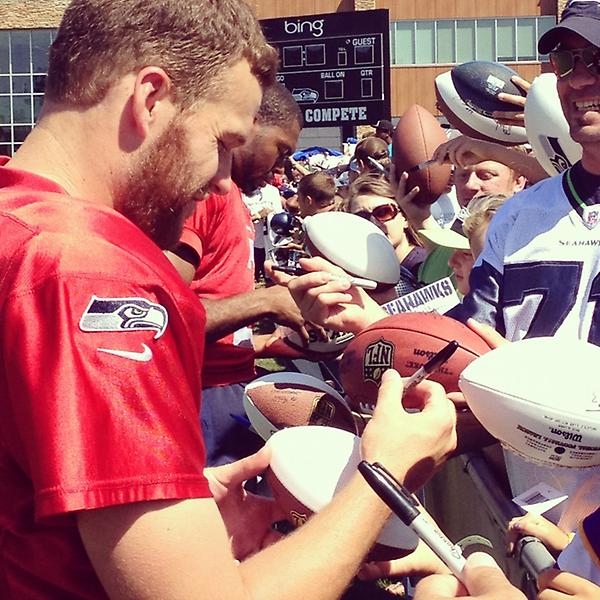 Eye4Photo's tweet photo. QBs rush the fans @Seahawks Training Camp Day 13 #VMAC #12thMan #Seahawks http://t.co/hEzbun5n