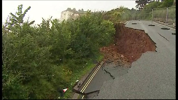 BBCBreakfast's tweet image. Do you know of a pothole as bad as the one our reporter Simon Clemison has found in Seaton in Devon?
