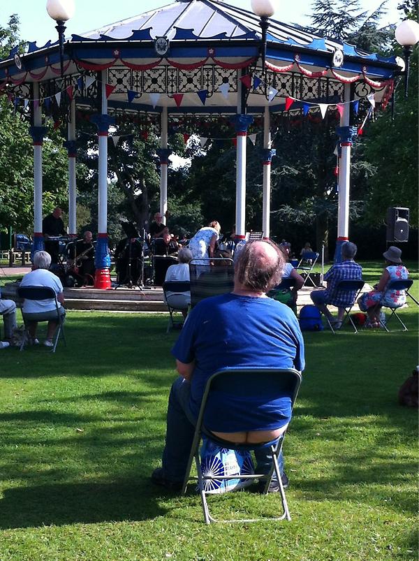 Watching a Jazz band at Priory Park, Southend. Amongst the audience is a chap with air conditioned trousers!