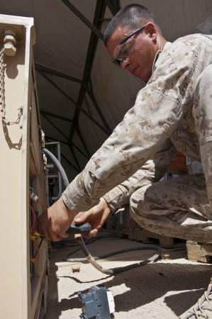 KODawg11's tweet photo. DVIDS-Images-One #Marine helps keep #CampLeatherneck cool  http://t.co/53IgQulC via @dvidshub #ACMechanic #USMC #SOT http://t.co/JVn93kJV