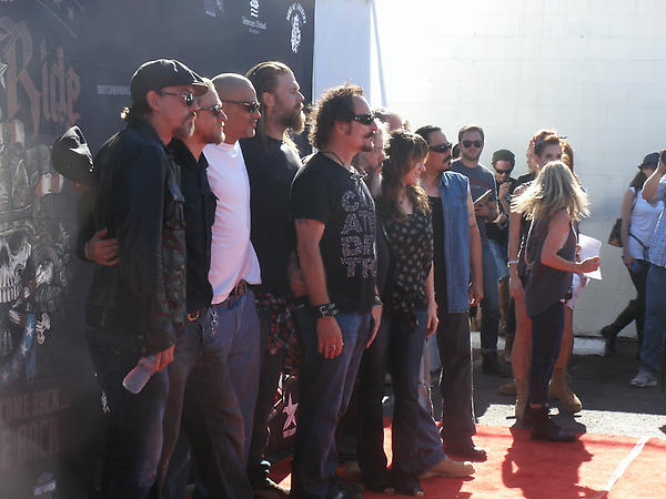 Allma_v's tweet image. I would fucking die to see this @FoxHomeEnt: Gang's all here at the #bootrally! Who's your fave @SonsofAnarchy member? http://t.co/teV2zITd”