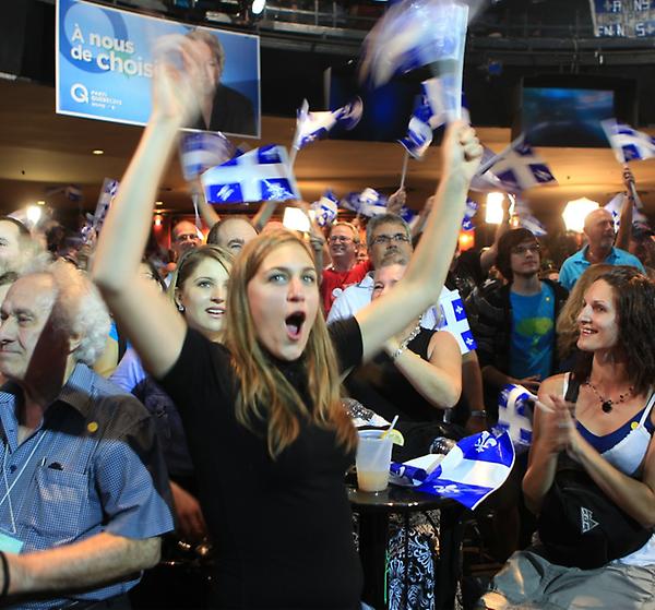 ObGazette's tweet photo. A woman cheers the announcement of the first female premier of Quebec, Pauline Marois. #Qc2012 http://t.co/cyxPK4Cm