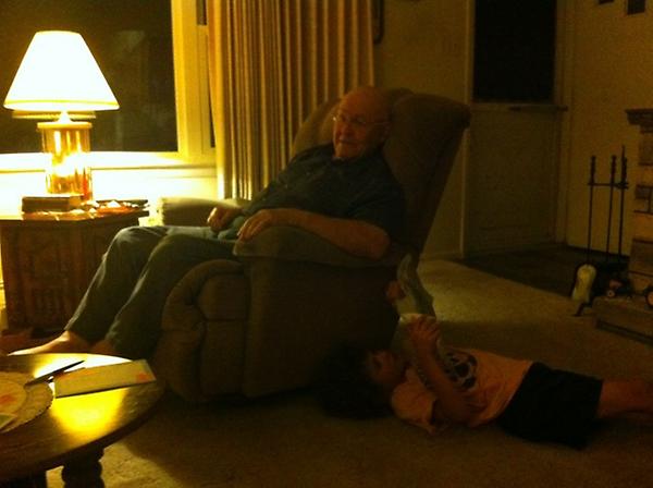 Reading to Papap on his 82nd birthday :)