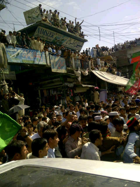 ImranKhanPTI's tweet photo. Crowds all across Dir and beyond. Making us move slowly but exciting to see such excited youth. http://t.co/gdZSXVxU