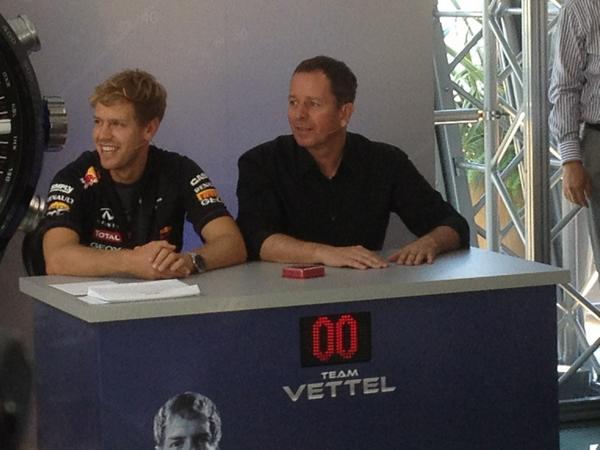 fakeVettel's tweet photo. They call me Vettel-ipeadia - the #F1 encyclopaedia  RT @redbullracing: Hands up for Team Vettel with @MBrundleF1 http://t.co/n7ECvlVQ”