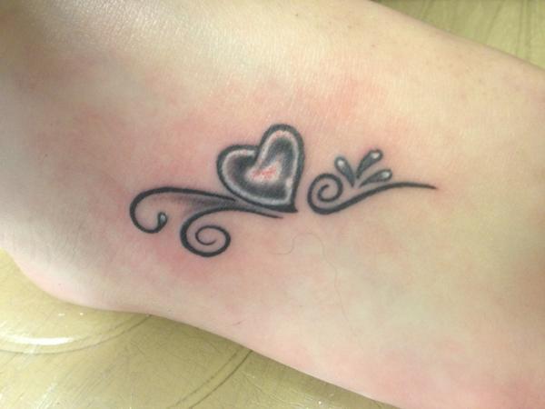 LanLan23's tweet photo. Tattoo done 😀 #yolo http://t.co/wLLJEBdF