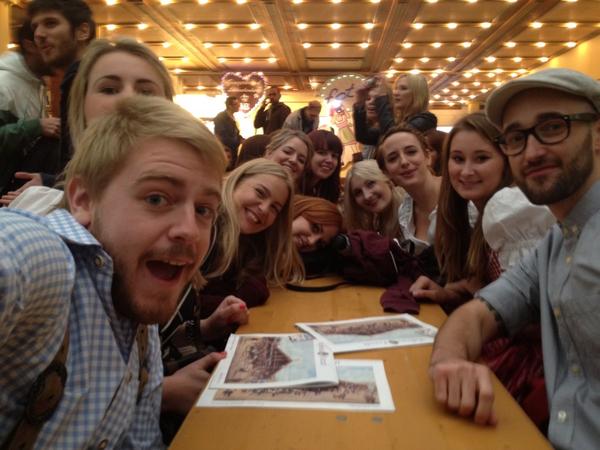 8:49am - #LiveFrom #Oktoberfest | We got a table, just waiting for the litres #excited